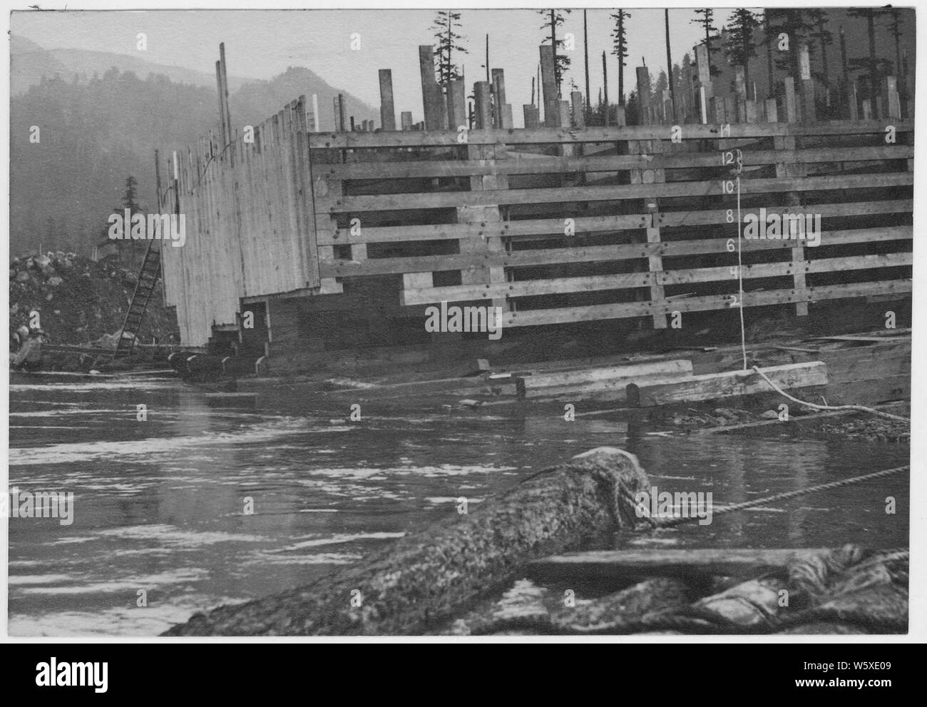 Public Works Administration Project, U.S. Army Corps of Engineers, Bonneville Dam in Oregon, Cofferdam Crib constructed on shore the sheeting cut to fit the irregularities of the river bottom. Stock Photo