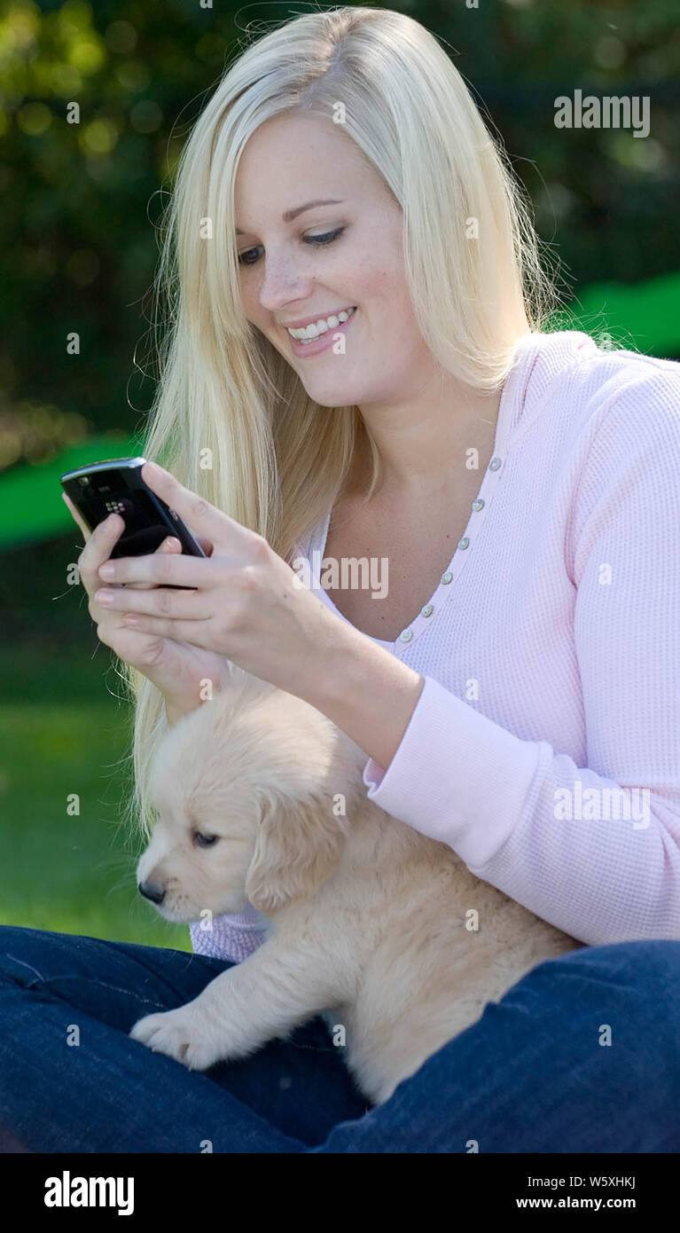 People with puppies Stock Photo