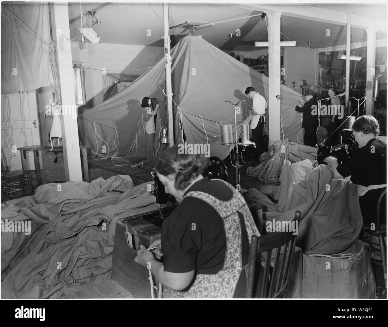 Rigging and inspecting of 8man pyramidal tents which are being