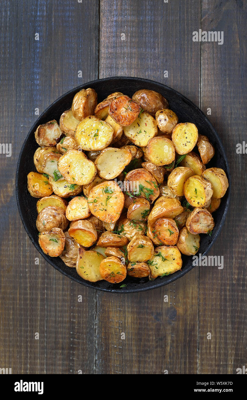 Roasted potato in a frying pan, top view Stock Photo