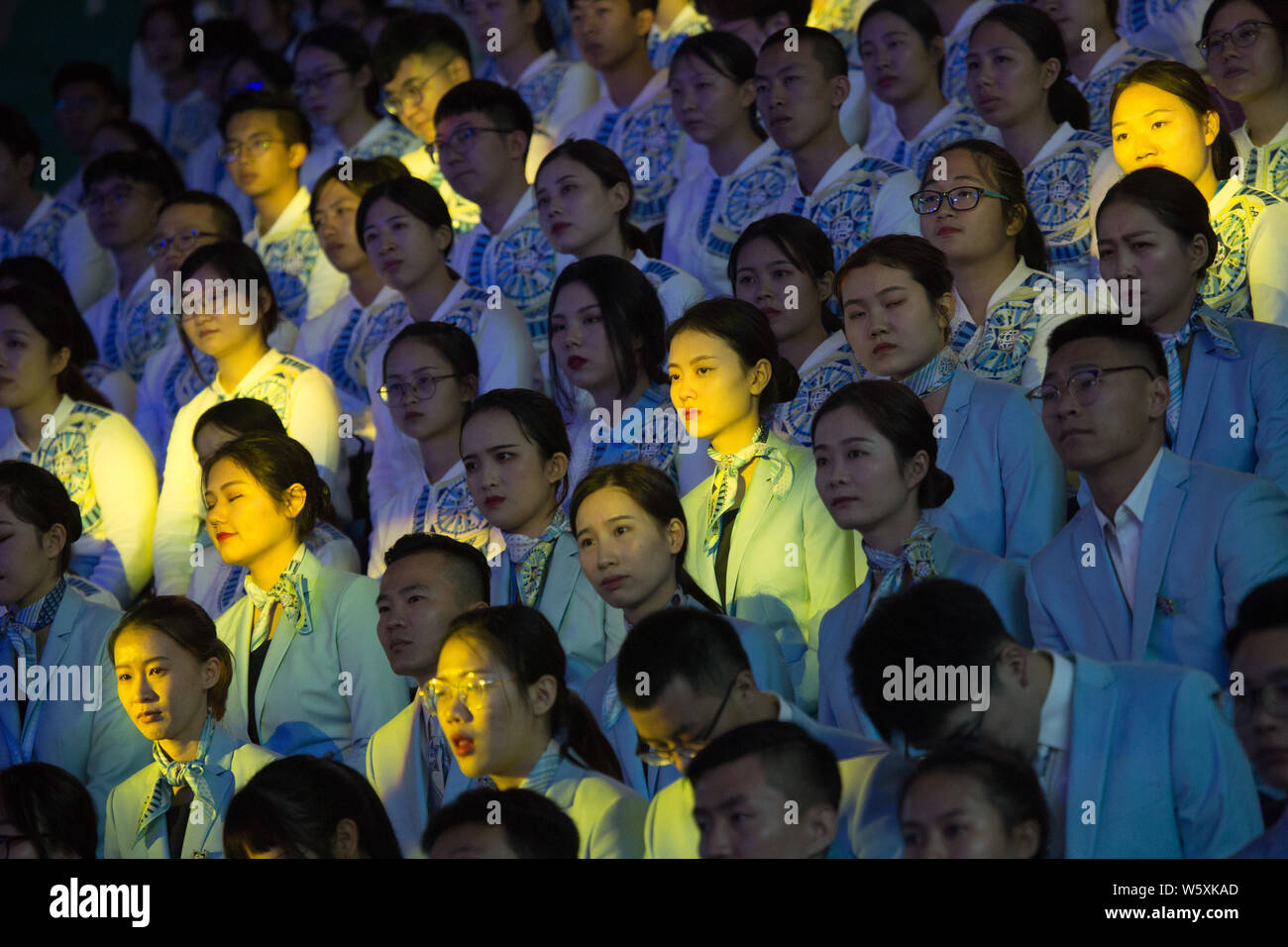 Chinese volunteers attend the launching ceremony for the upcoming United Nations World Geospatial Information Congress (UNWGIC) in Deqing county, Huzh Stock Photo