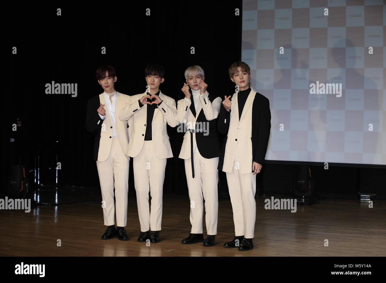 Members of South Korean vocal group Voisper attend a showcase to release their first full-length album 'Wishes' in Seoul, South Korea, 20 November 201 Stock Photo