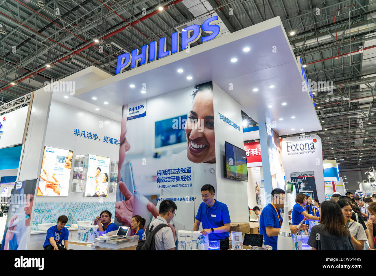 FILEPeople visit the stand of Philips during an expo in Shanghai