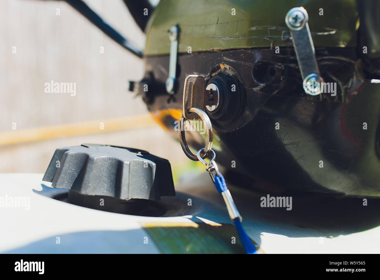 quad bike Motorcycle ignition key switch. Starting motorcycle. Fragment