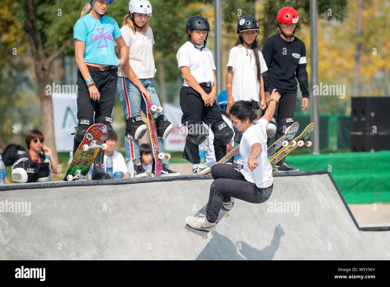 A player takes part in a training session ahead of the 2018 World Skate Park Skateboarding World Championships at the Nanjing Fish-mouth National Skat Stock Photo