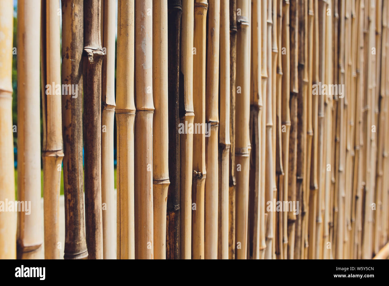 old brown tone bamboo plank fence texture for background Stock Photo - Alamy