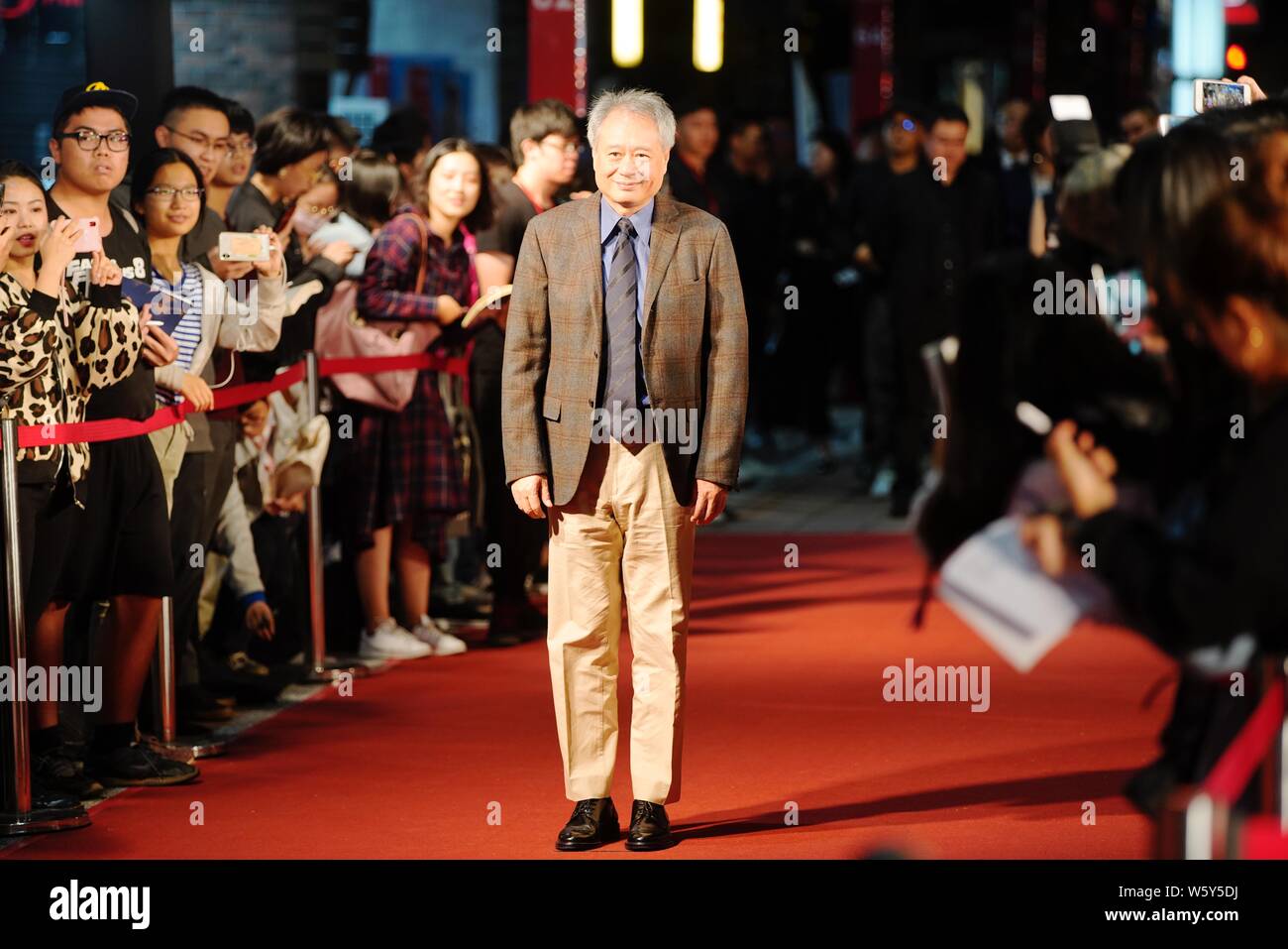 Taiwanese director Ang Lee arrives on the red carpet to support the ...