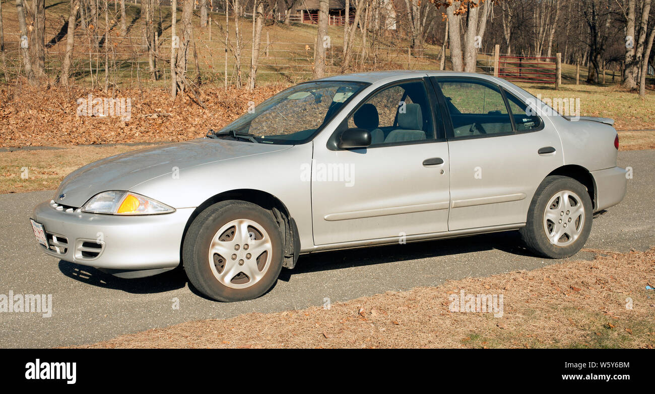 2000 Chevrolet Cavalier parked outside.  1) Wri Stock Photo