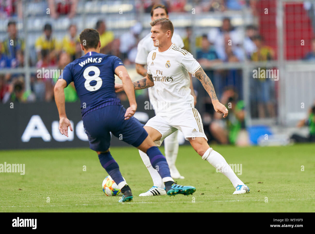 Munich, Germany. 30th July, 2019. Toni KROOS, Real Madrid 8 compete for the ball, tackling, duel, header, zweikampf, action, fight against Harry WINKS, Hotspurs 8 REAL MADRID - TOTTENHAM HOTSPURS AUDI CUP 2019, A l l i a n z A r e n a Munich, July 30, 2019 Season 2019/2020, Credit: Peter Schatz/Alamy Live News Stock Photo