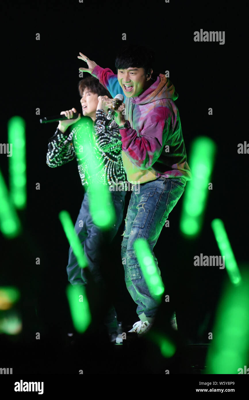 Roy Wang Yuan, left, of Chinese boy group TFBoys and his idol