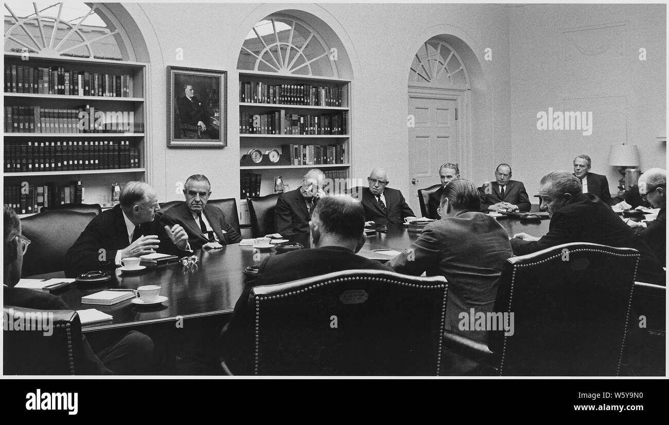 The Wise Men: Cabinet Room meeting; Scope and content:  Location: White House Cabinet Room. Depicted: (clockwise) Robert Murphy, Ambassador Averell Harriman, Dean Acheson, General Omar Bradley, General Maxwell Taylor, Justice Abe Fortas, Clark Clifford, Secretary of State Dean Rusk, President Lyndon B. Johnson, Secretary of Defense Robert McNamara, Douglas Dillon, McGeorge Bundy. Stock Photo