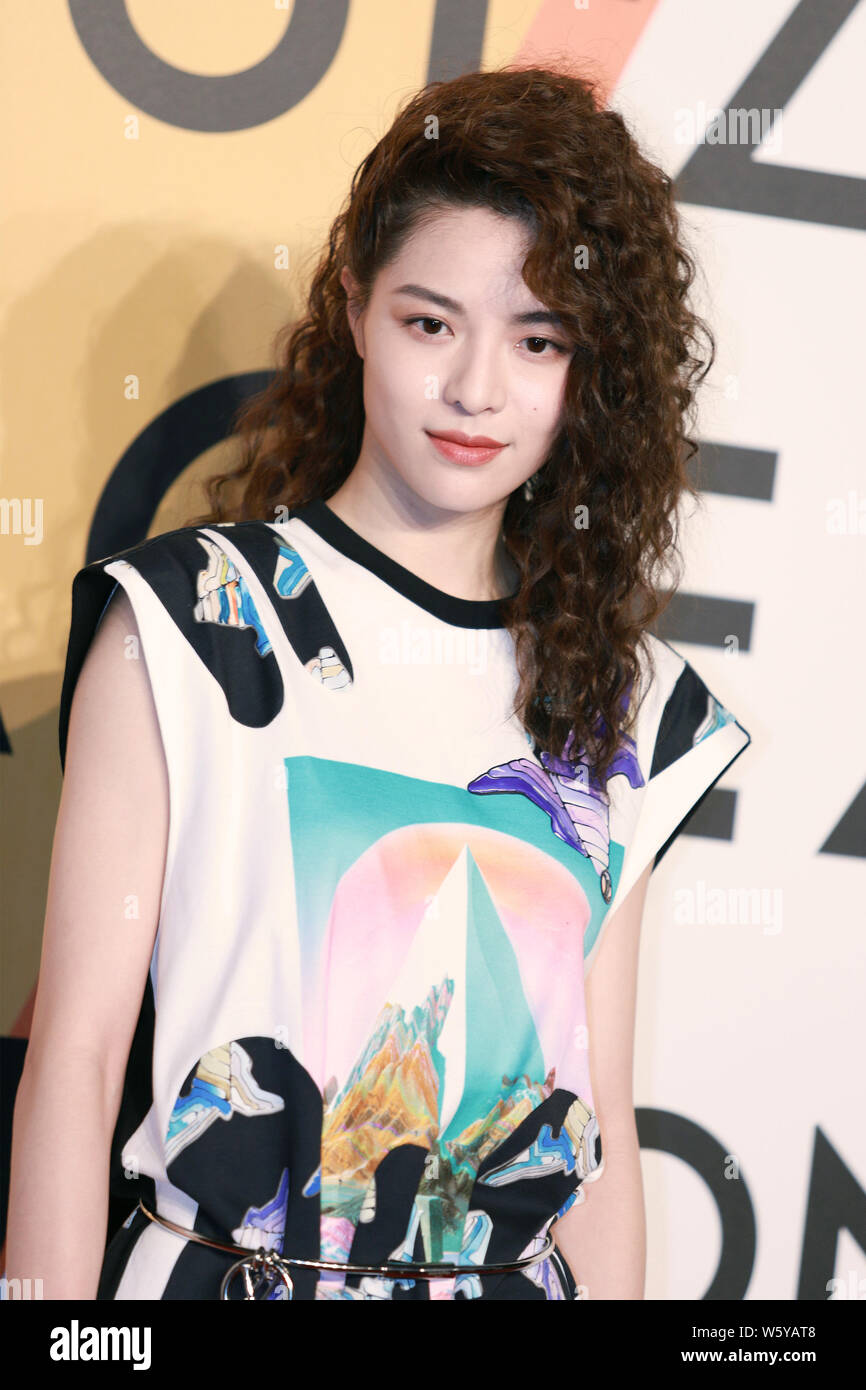 Chinese actress Zhong Chuxi, also known as Elane Zhong, poses as she  attends the Louis Vuitton \