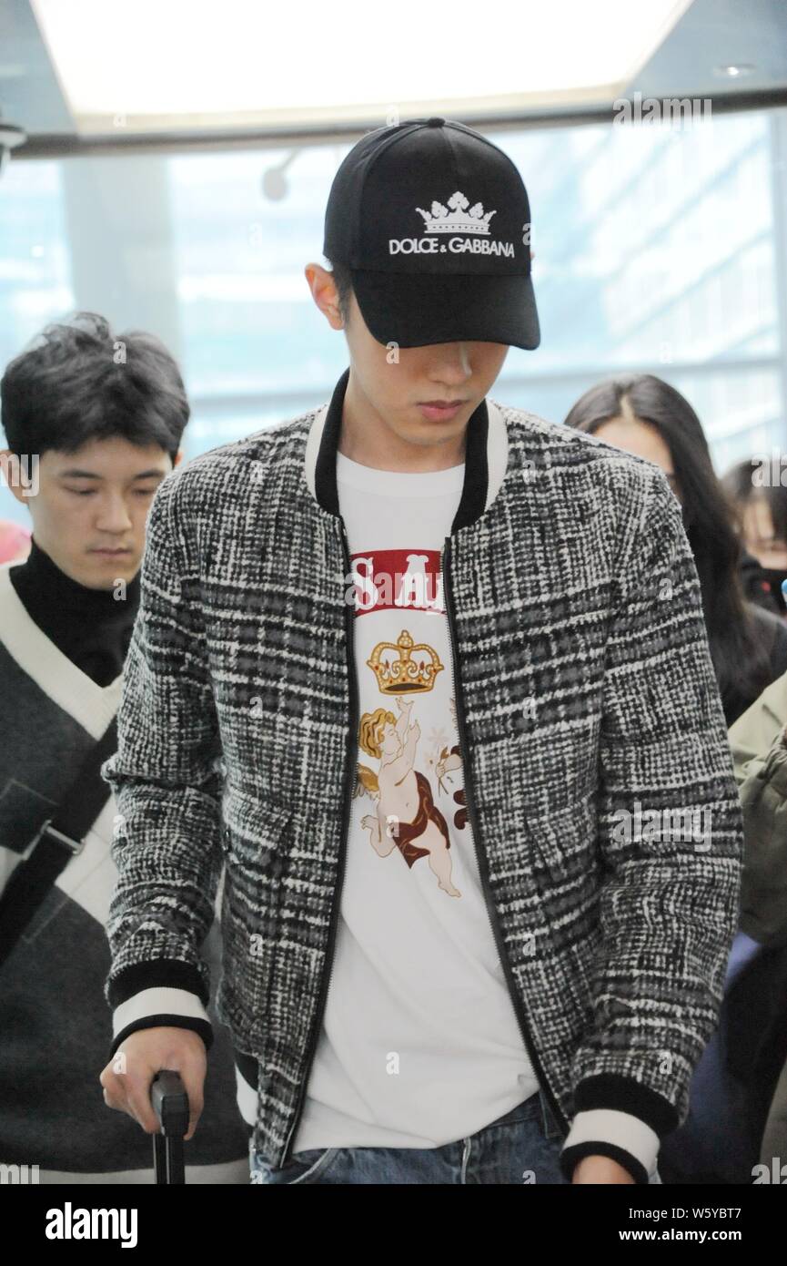 Chinese actor Connor Leong or Liang Jingkang of the new lineup of Chinese boy group F4 arrives at the Shanghai Hongqiao International Airport after la Stock Photo