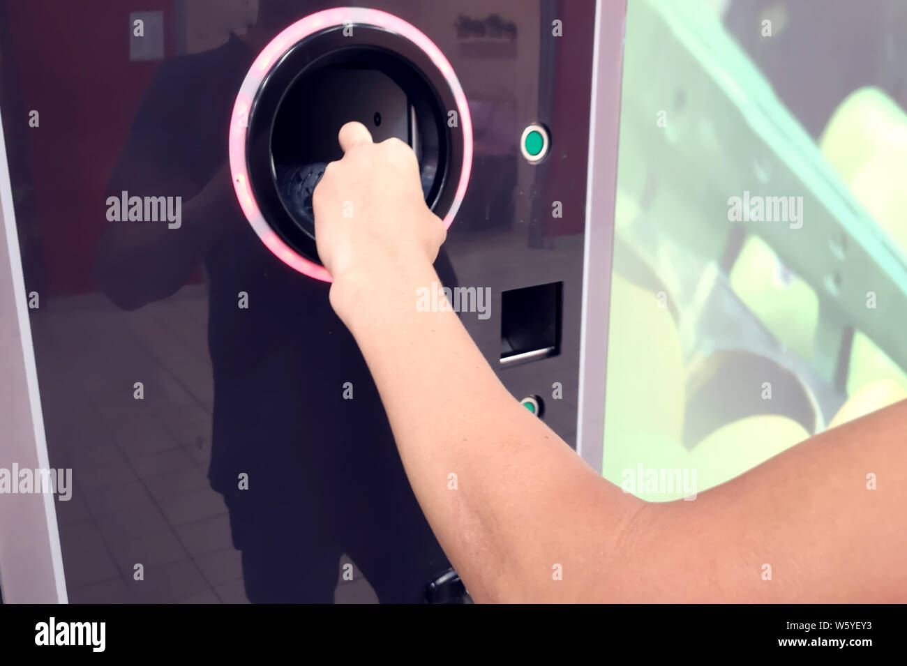 Shoppers return their bottles and cans of reusable packagings in a