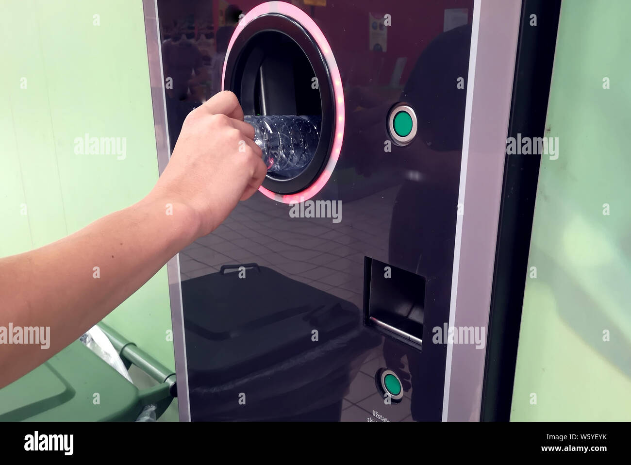 Shoppers return their bottles and cans of reusable packagings in a