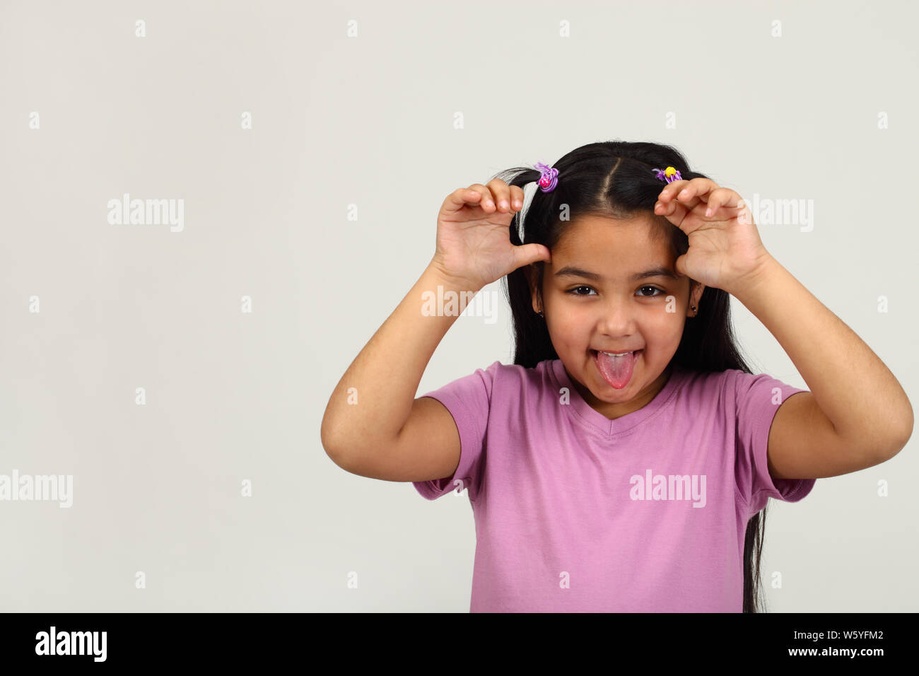 Girl Making A Funny Face Stock Photo Alamy