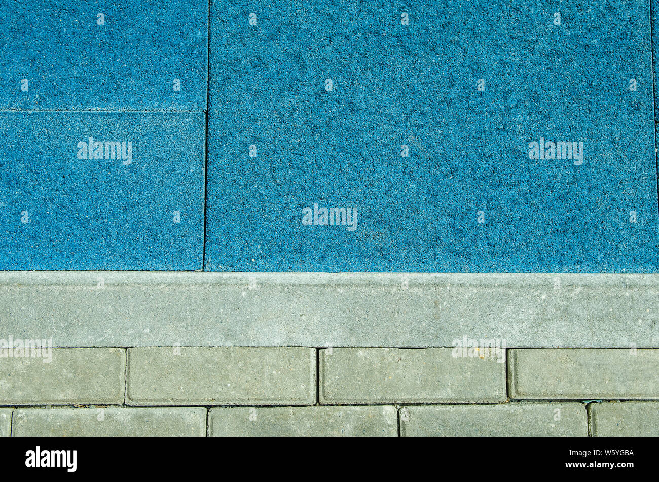 background texture grey bricks and blue coating Stock Photo