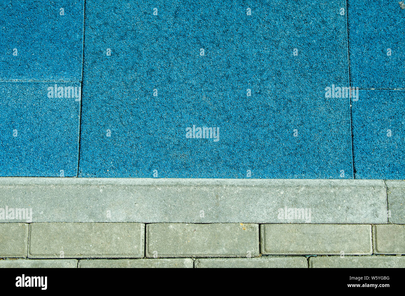 background texture grey bricks and blue coating Stock Photo