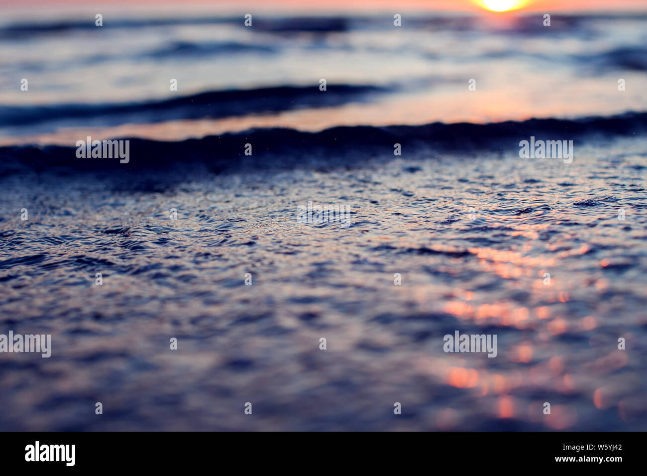 Sea and sky with clouds at sunset. Beach in the evening Stock Photo - Alamy