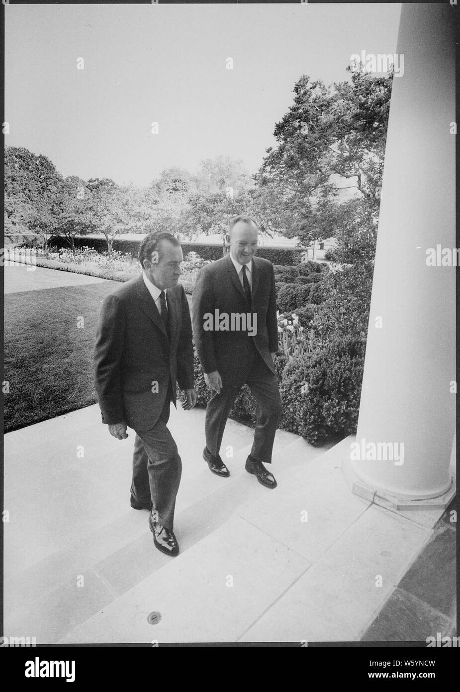 White House exterior; Scope and content:  Pictured: President Nixon, John Eisenhower. Subject: Mamie Eisenhower - John Eisenhower. Stock Photo