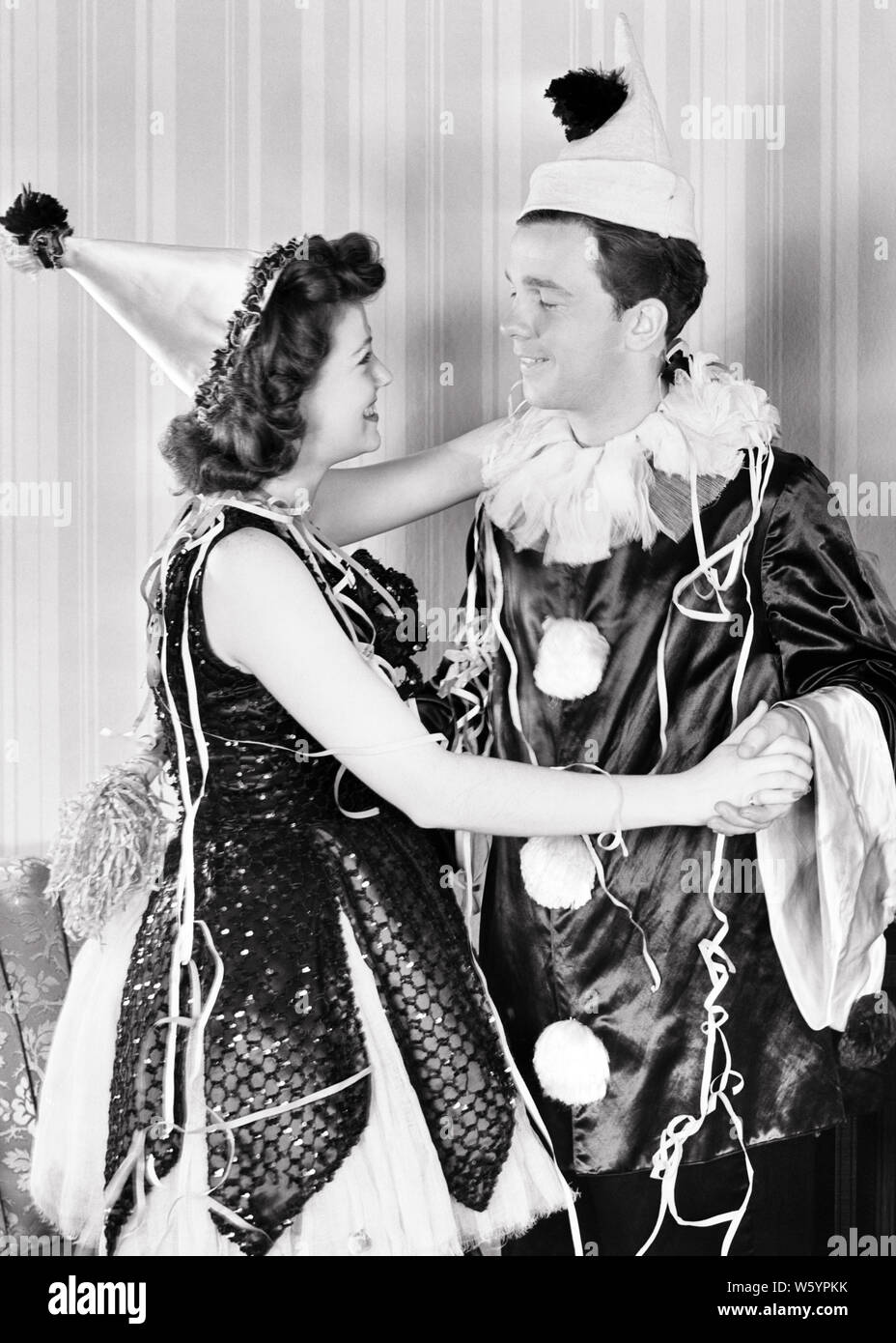 1940s SMILING COUPLE MAN AND WOMAN DANCING TOGETHER AT COSTUME PARTY - d897  HAR001 HARS EXPRESSION DANCERS MAGIC OLD TIME SURPRISE NOSTALGIA OLD  FASHION 1 SILLY FACIAL STYLE YOUNG ADULT BALANCE COMIC
