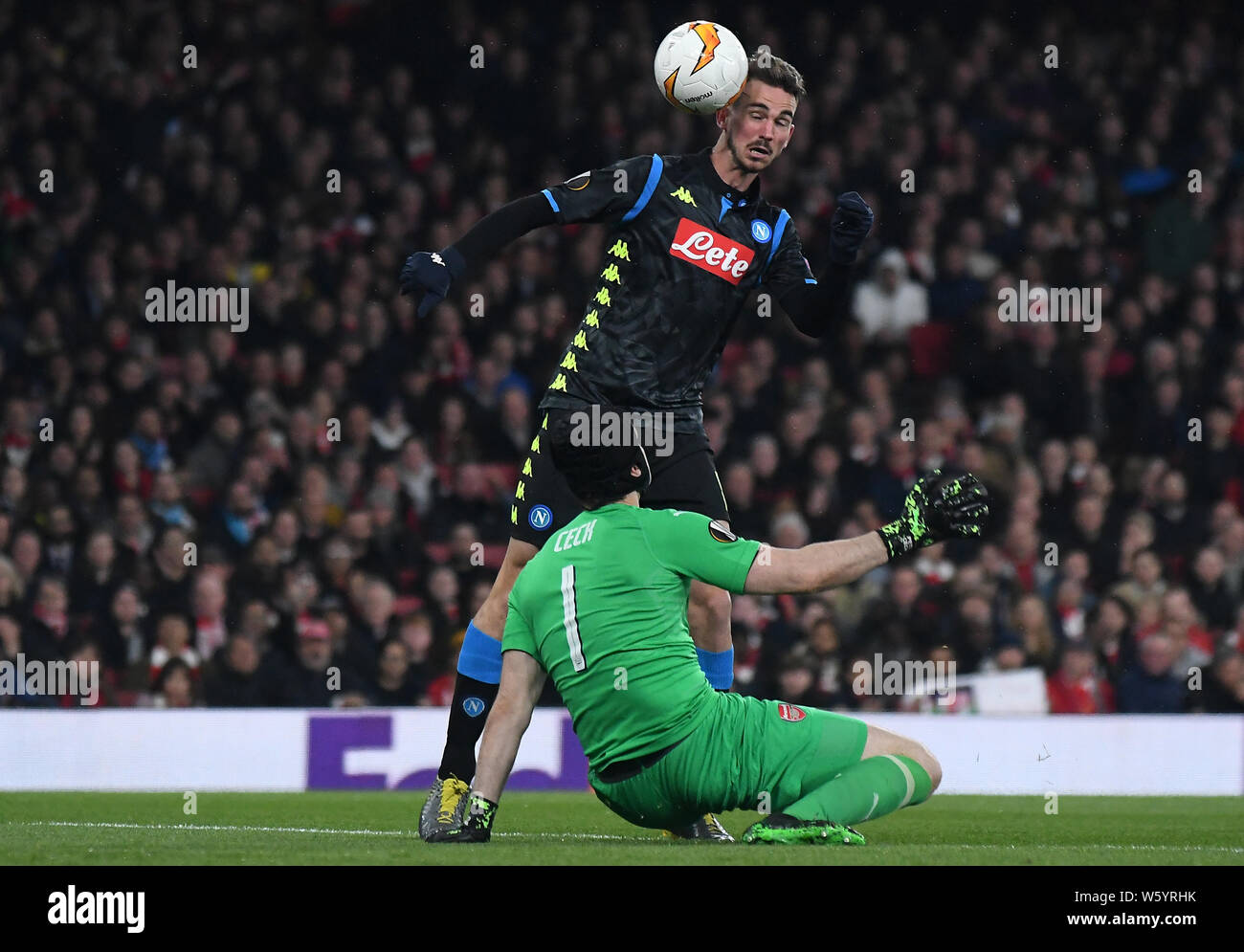 LONDON, ENGLAND - APRIL 11, 2019: Fabian Ruiz Pena of Napoli and Petr Cech of Arsenal pictured during the first leg of the 2018/19 UEFA Europa League Quarter-finals game between Arsenal FC (England) and SSC Napoli (Italy) at Emirates Stadium. Stock Photo