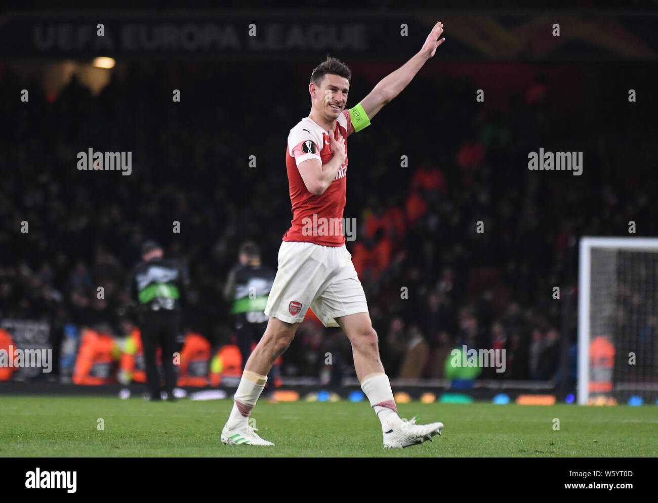 LONDON, ENGLAND - APRIL 11, 2019: Laurent Koscielny of Arsenal salutes the fans after the first leg of the 2018/19 UEFA Europa League Quarter-finals game between Arsenal FC (England) and SSC Napoli (Italy) at Emirates Stadium. Stock Photo