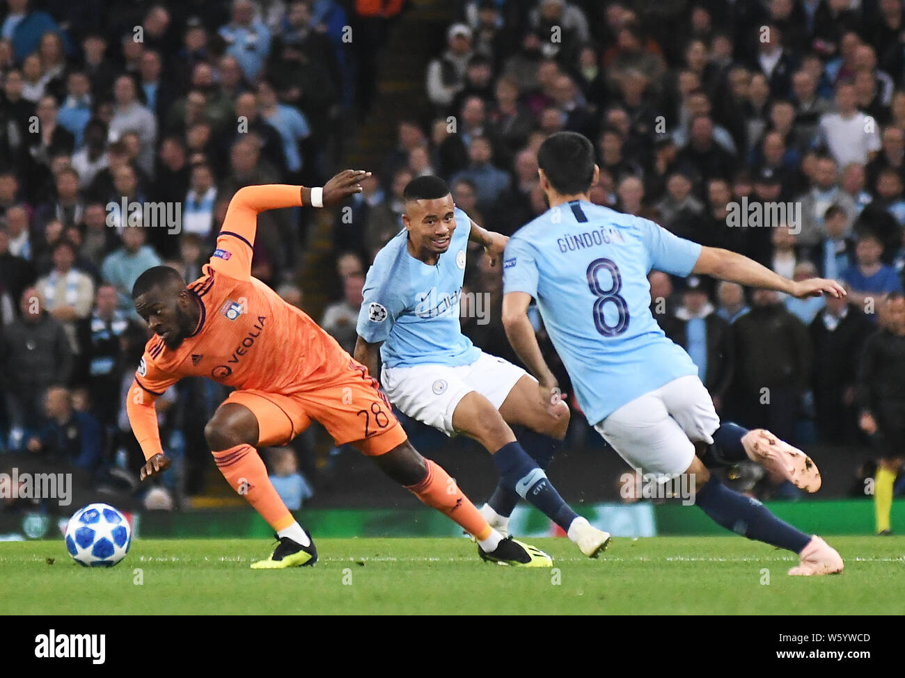 MANCHESTER, ENGLAND - SEPTEMBER 19, 2018: Tanguy Ndombele of Lyon  (L) and Gabriel Jesus of City (C) pictured during the 2018/19 UEFA Champions League Group F game between Manchester City (England) and Olympique Lyonnais (France) at Etihad Stadium. Stock Photo