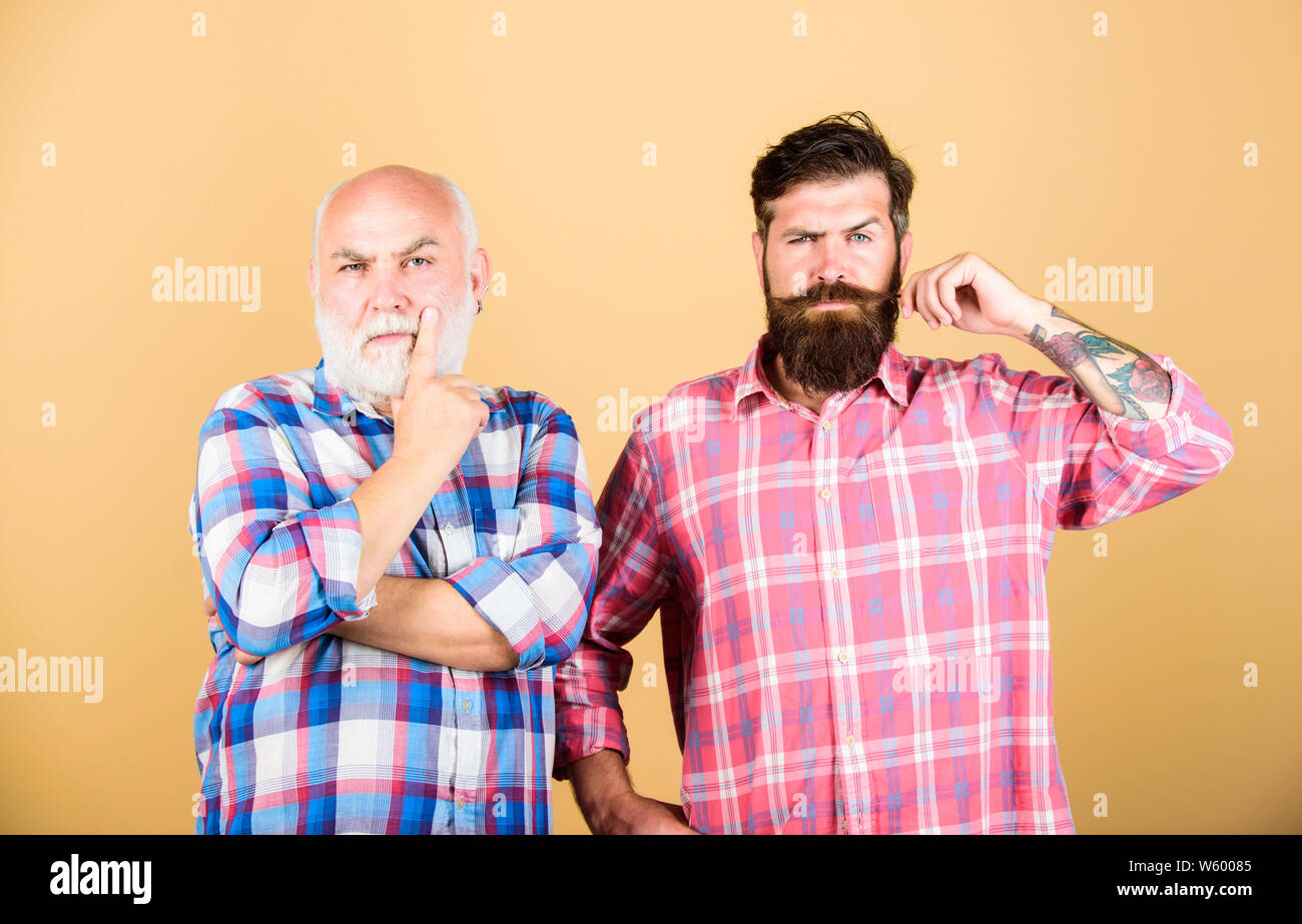 Brutality and masculinity. Bearded friends. Father and son. Hairdresser ...
