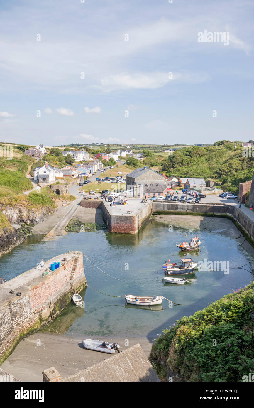 The harbour at Porthgain a coastal village within the Pembrokeshire Coast National Park, Wales, UK Stock Photo