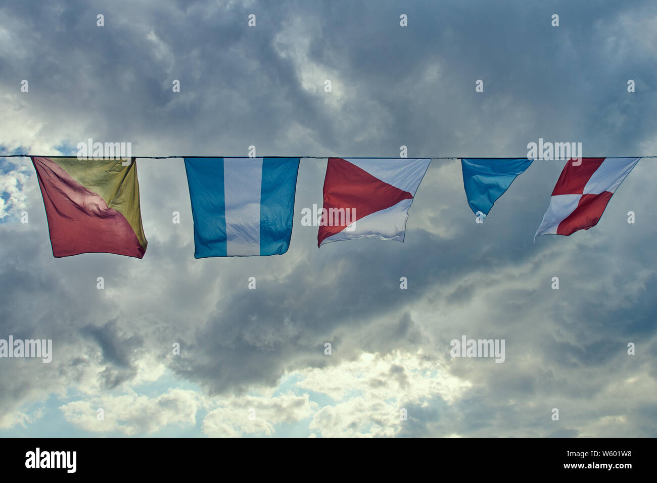 naval flags fluttering in the wind against the sky Stock Photo Alamy