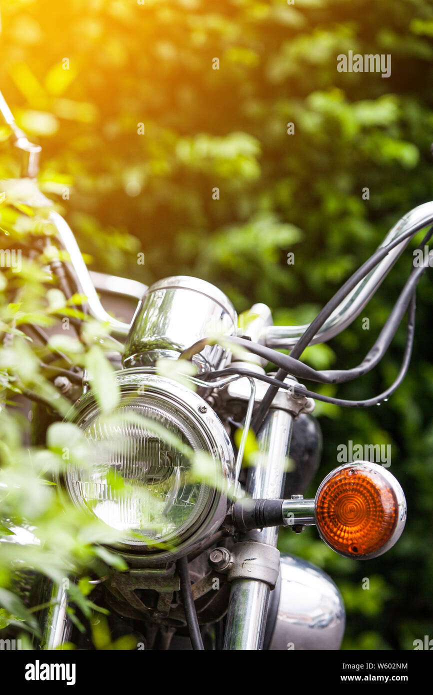 Classic motorcycle headlight view background Stock Photo - Alamy