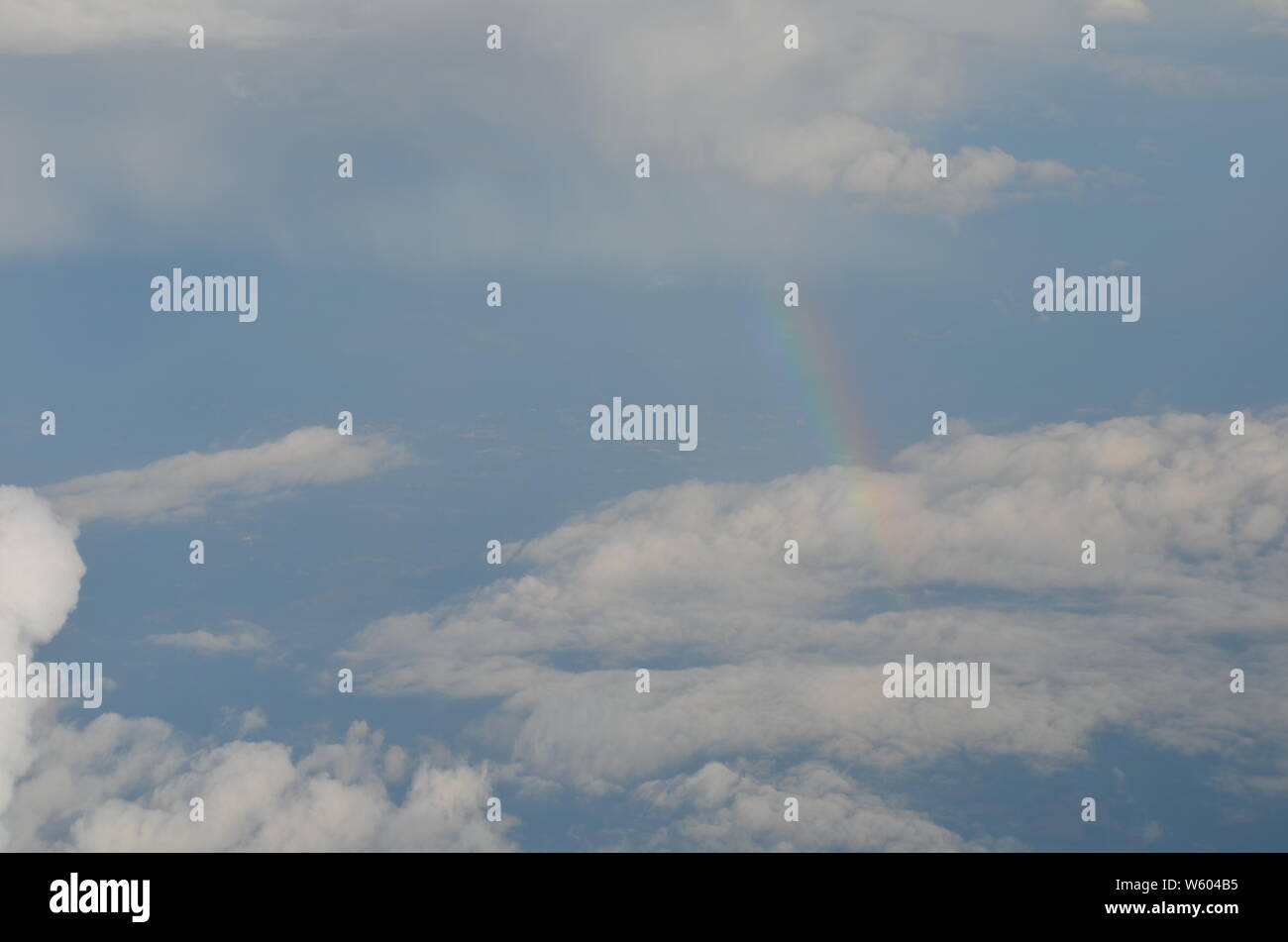 Cumulus cloud rainbow hi-res stock photography and images - Alamy
