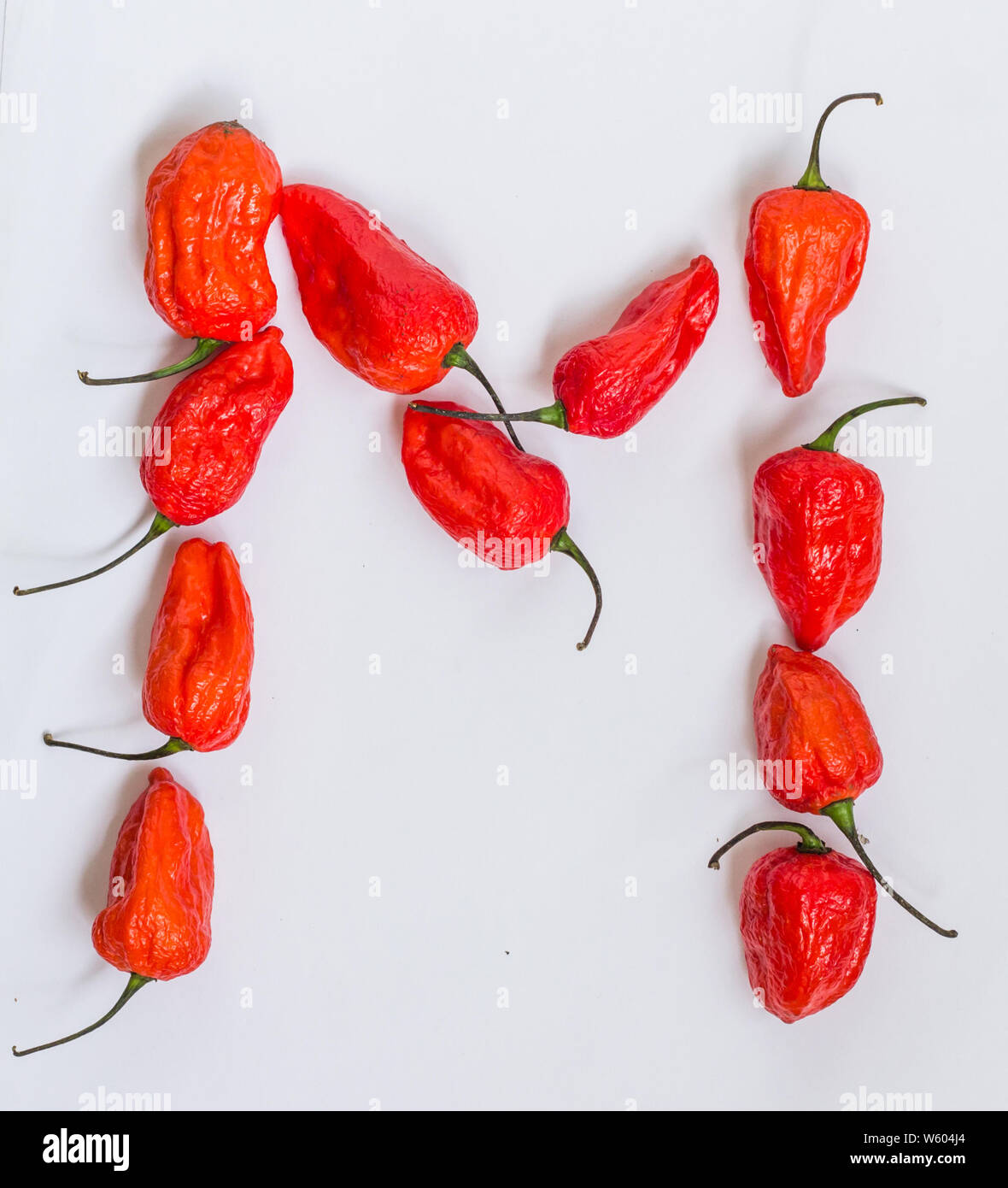 Letter M Alphabet Made With Ghost Pepper Bhoot Jolokia Over White 