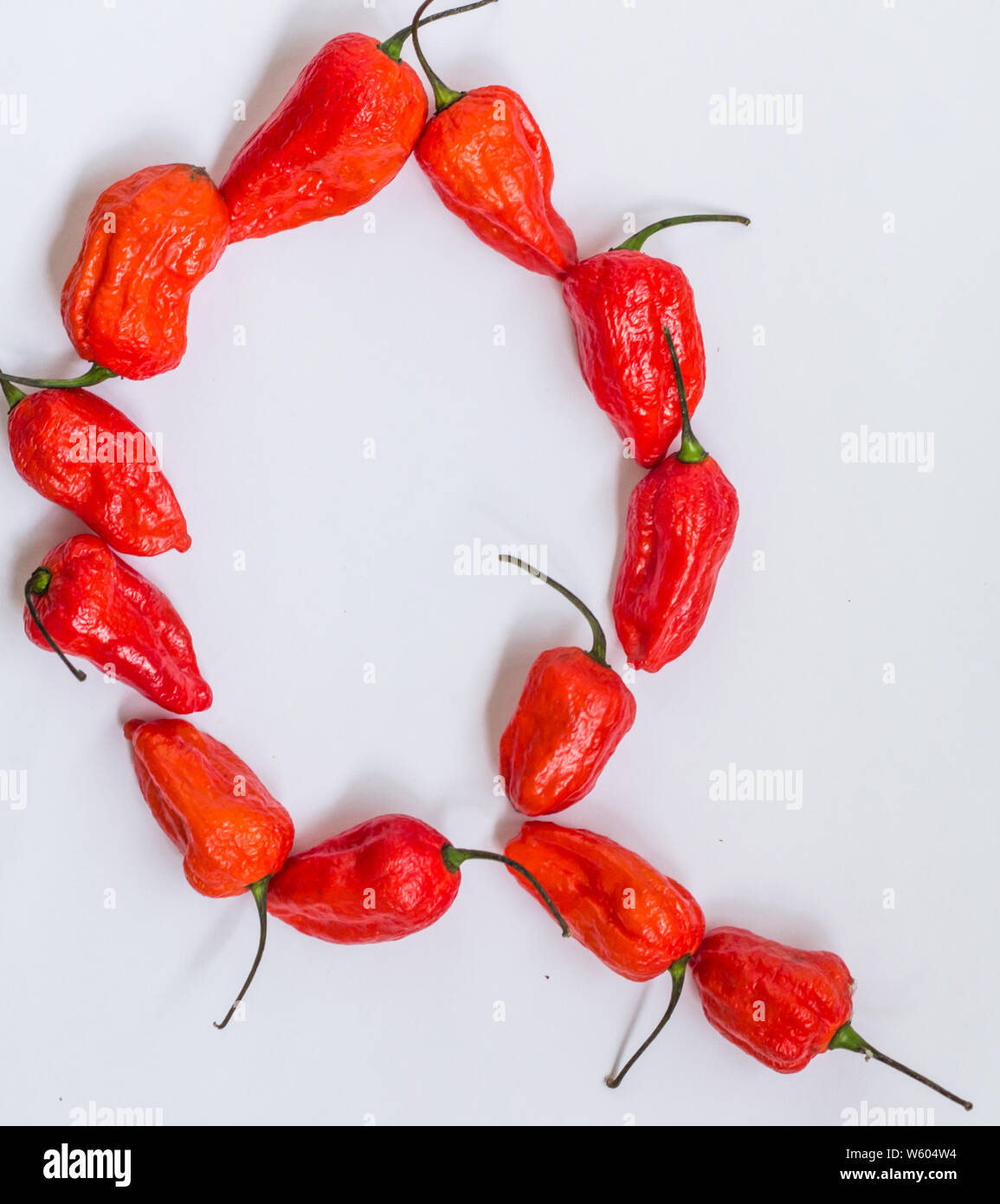 Letter Q Alphabet Made With Ghost Pepper Bhoot Jolokia Over White 
