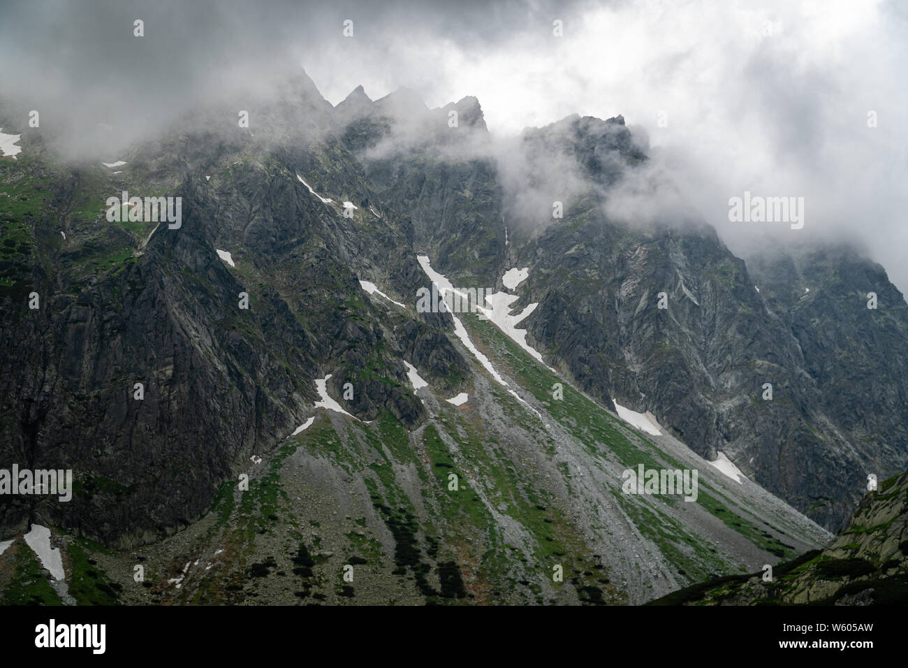 High Tatras mountain range covered in clouds Stock Photo