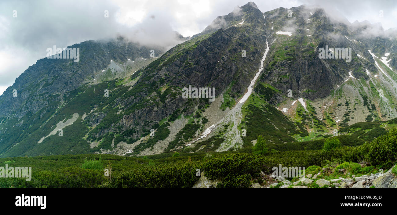 High Tatras mountain range covered in clouds Stock Photo - Alamy