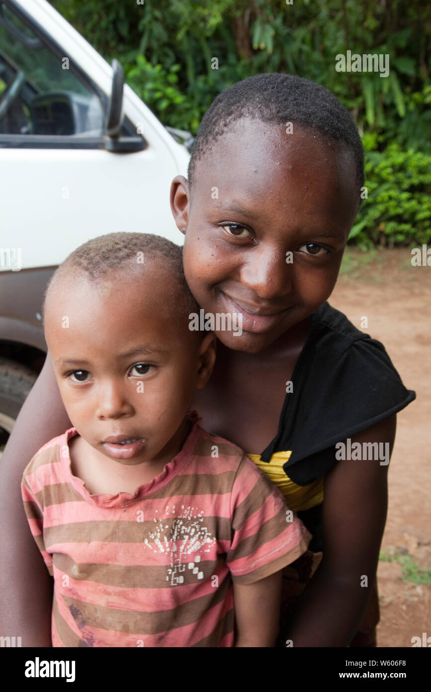 Tanznia, Africa, Children femal and male playing and being happy. Very poor but clean and smiling. Very healthy atractive young people. Stock Photo