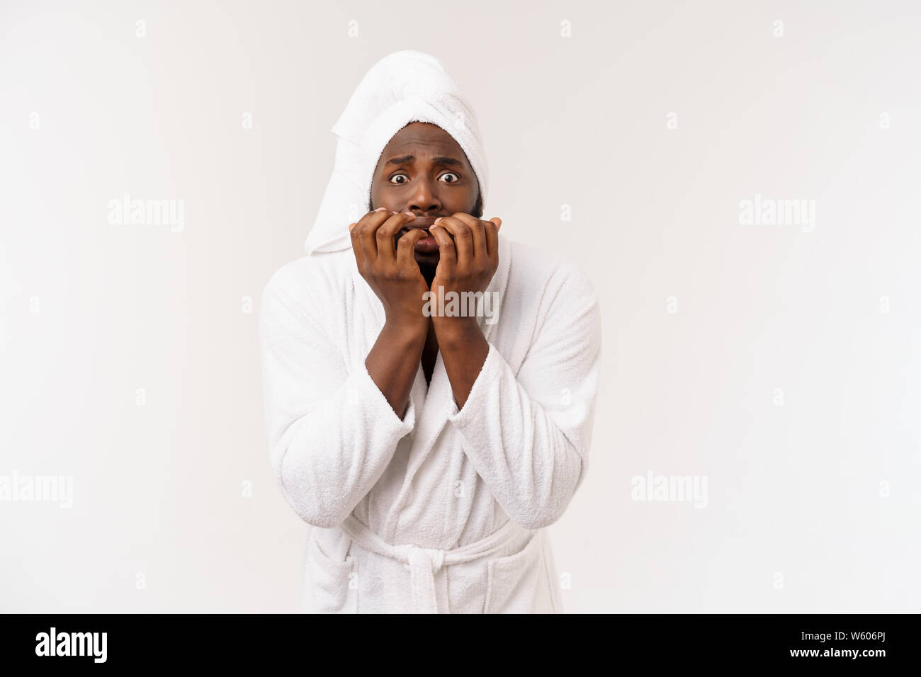 Portrait of excited young African American male screaming in shock and