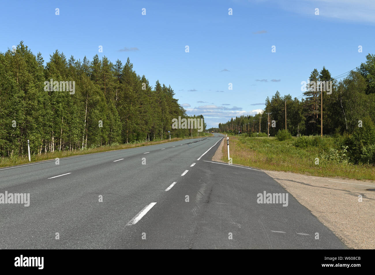 Northern Highway in Finnish Lapland. Bright sunny day Stock Photo