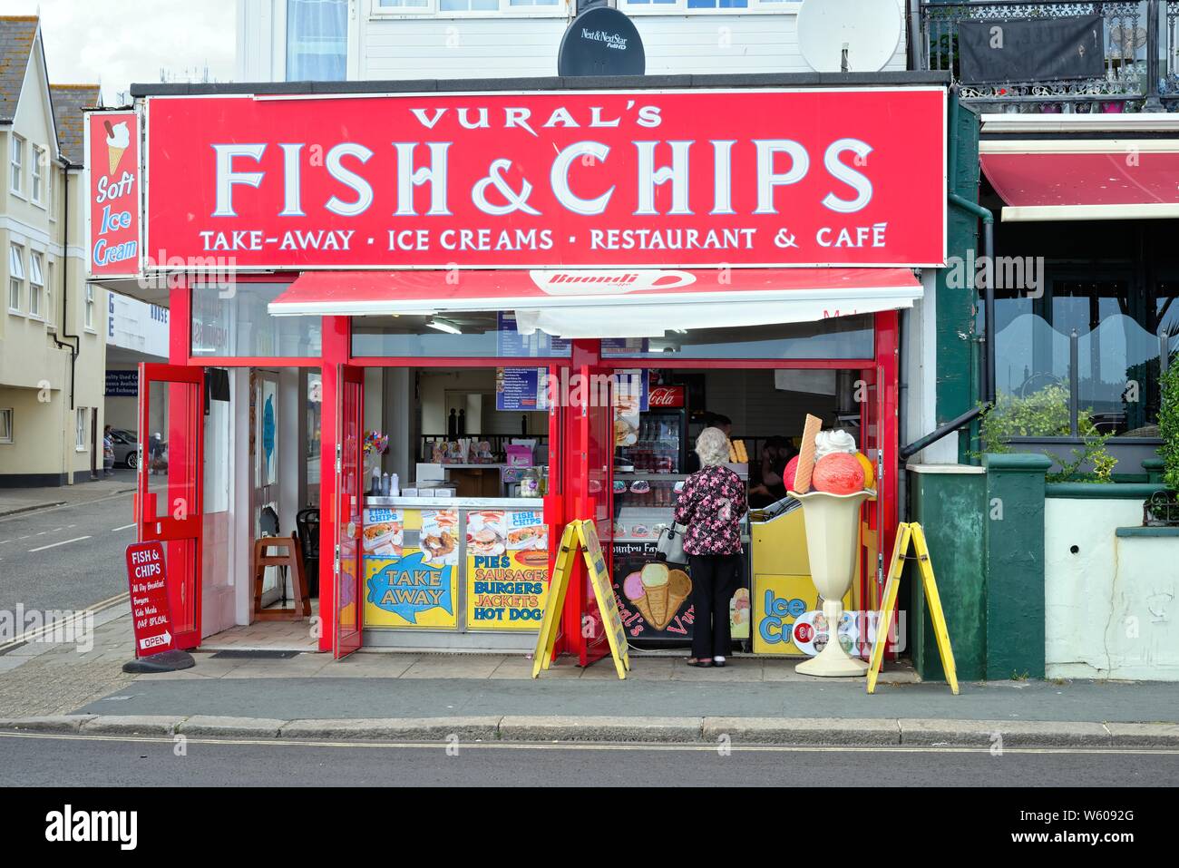 Shop front of a fish and chips food bar on Bognor Regis seafront, West Sussex England UK Stock Photo