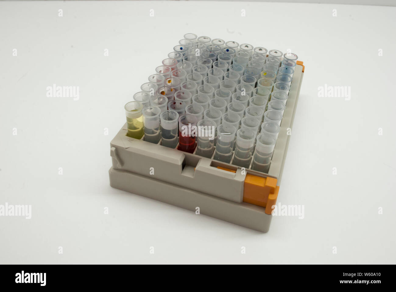 Laboratory research. A bunch of laboratory bulbs in the box close up isolated on white. Pharmacy factory. Scientific bio medicine modern technology Stock Photo