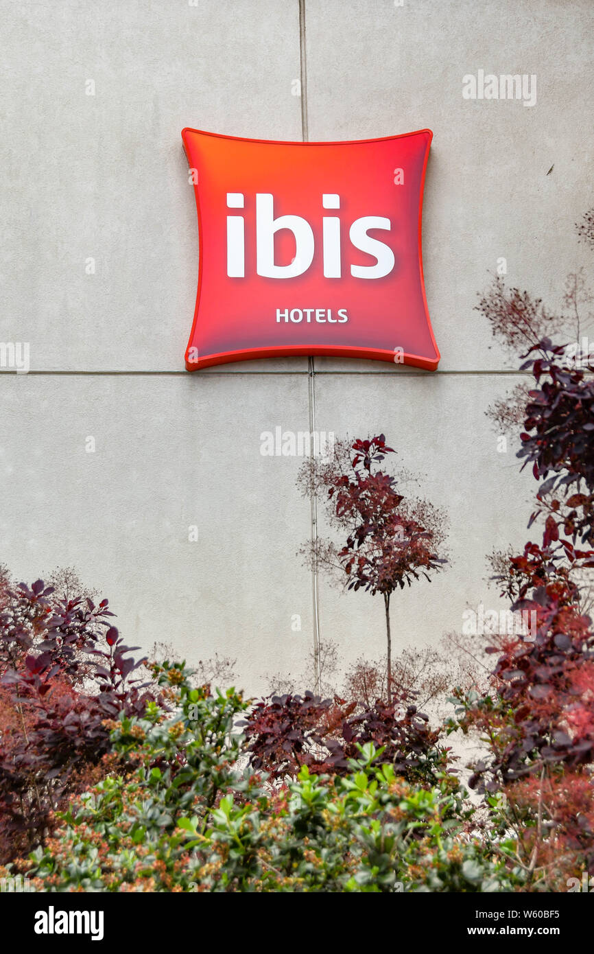 CARDIFF, WALES - JULY 2019: Sign on the wall of the IBIS hotel in Cardiff city centre Stock Photo