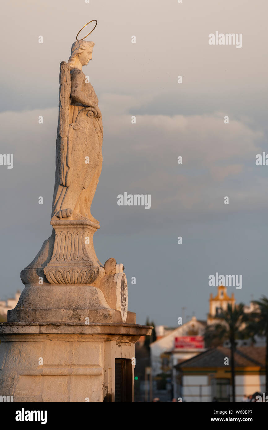 Europe, Iberia, Spain,Andalusia, Cordoba, statue near The Roman Bridge over the Guadalquivir Stock Photo