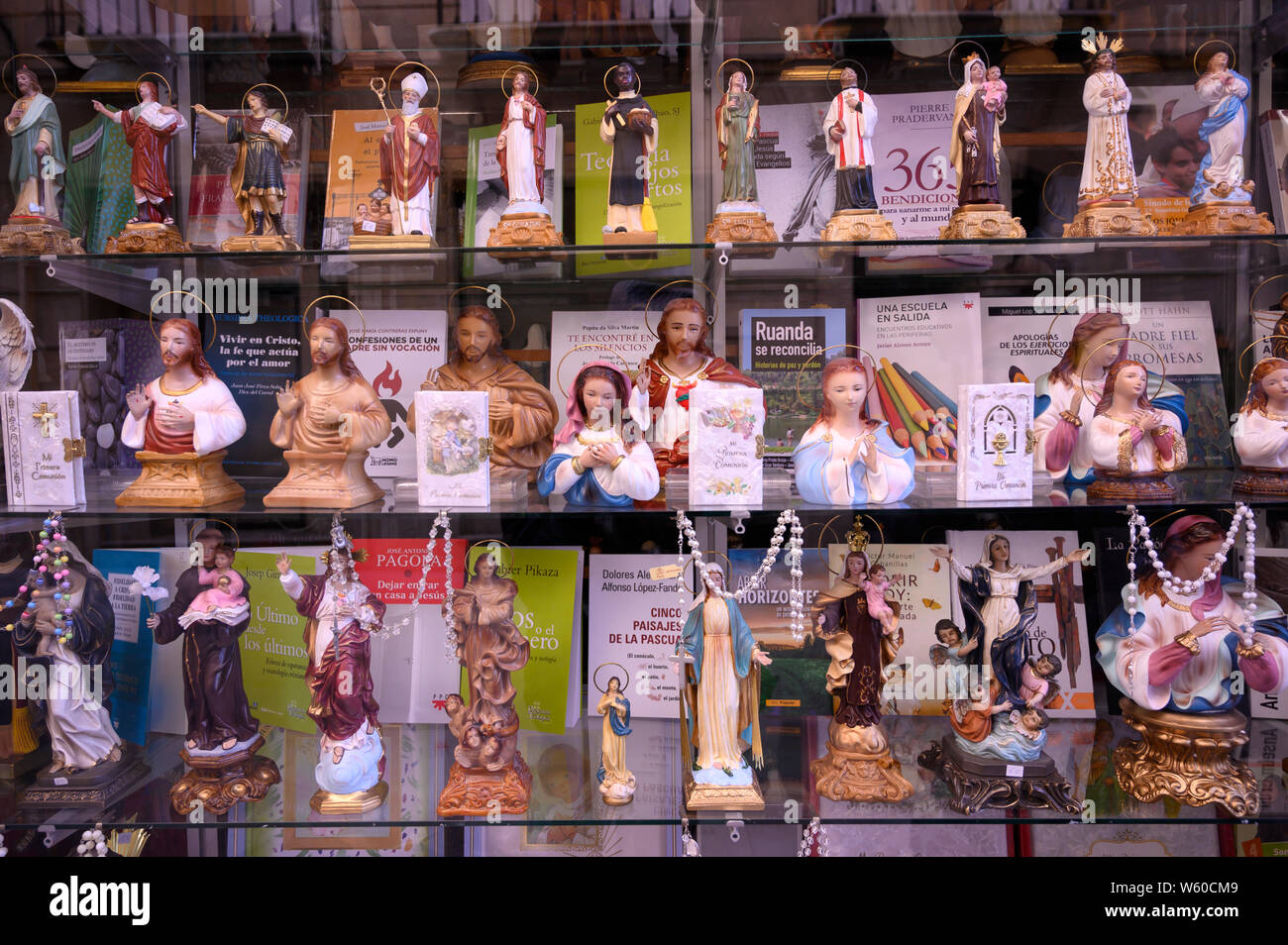 Europe, Iberia, Spain, Spanish, Southern, Andalusia, Granada, Shop window with religious statues Stock Photo