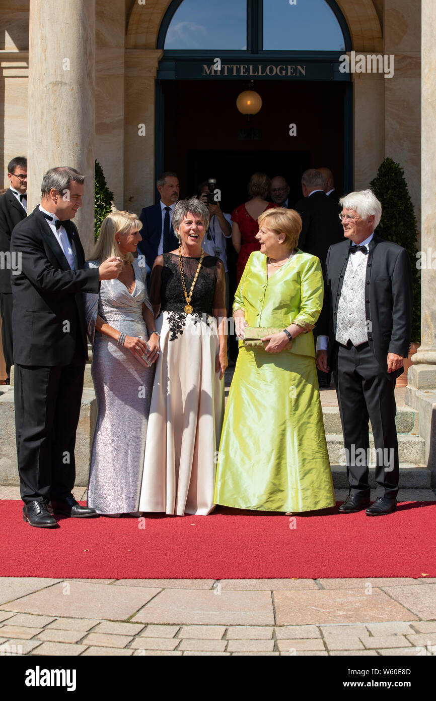 Markus Söder mit Ehefrau Karin Baumüller, Brigitte Merk-Erbe, Angela Merkel und Thomas Erbe bei der Eröffnung der Richard-Wagner-Festspiele 2019 mit d Stock Photo