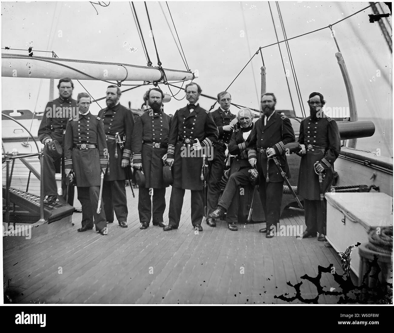 Admiral John A. Dahlgren and group. 1. Lieut. Commander E.J. Dichman, 2. Fleet Surgeon Wm. Johnson, 3. Paymaster J.H. Watmouth, 4. Commander J.M. Bradford, 5. Admiral Dahlgren, 6. Lieut. Commander E.O. Matthews; General notes:  Use War and Conflict Number 129 when ordering a reproduction or requesting information about this image. Stock Photo