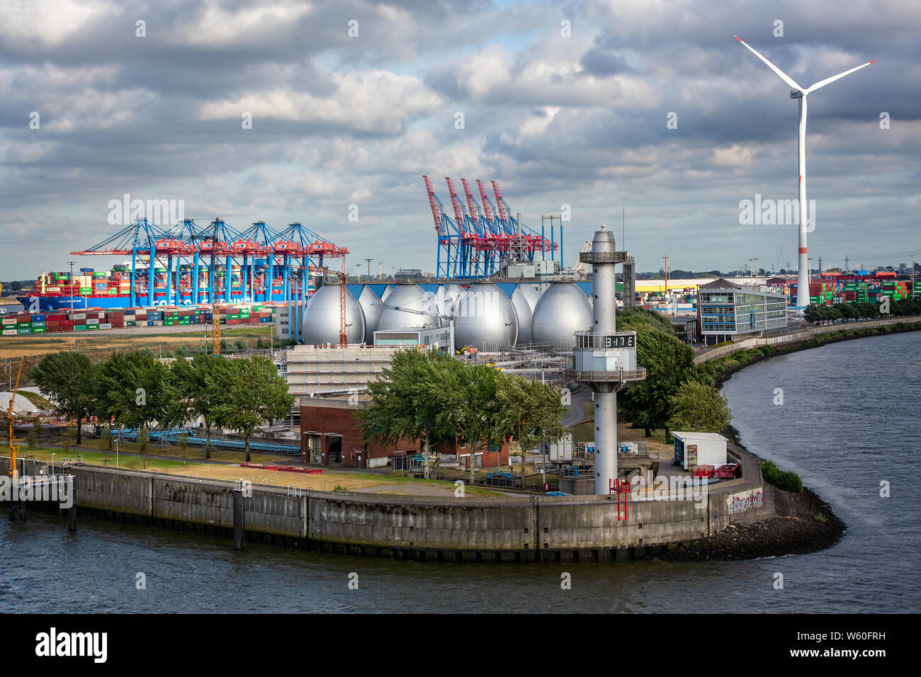 Industrial complex on shore line of River Elbe sewage treatment plant, container port and