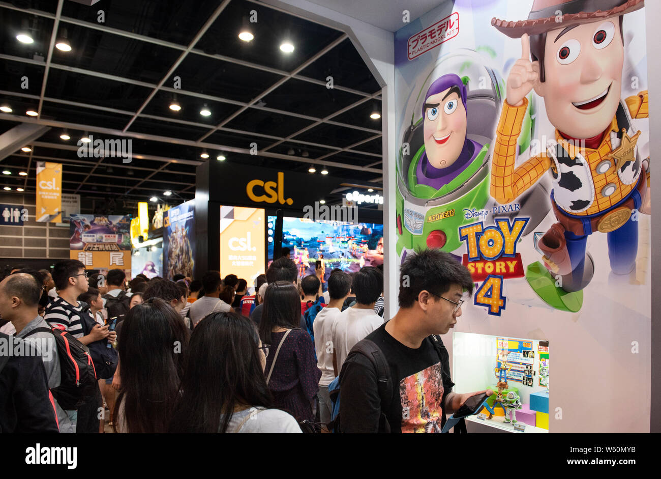 Visitors are seen at Pixar Animation Studios' Toy Story booth during the Ani-Com & Games event in Hong Kong. Stock Photo