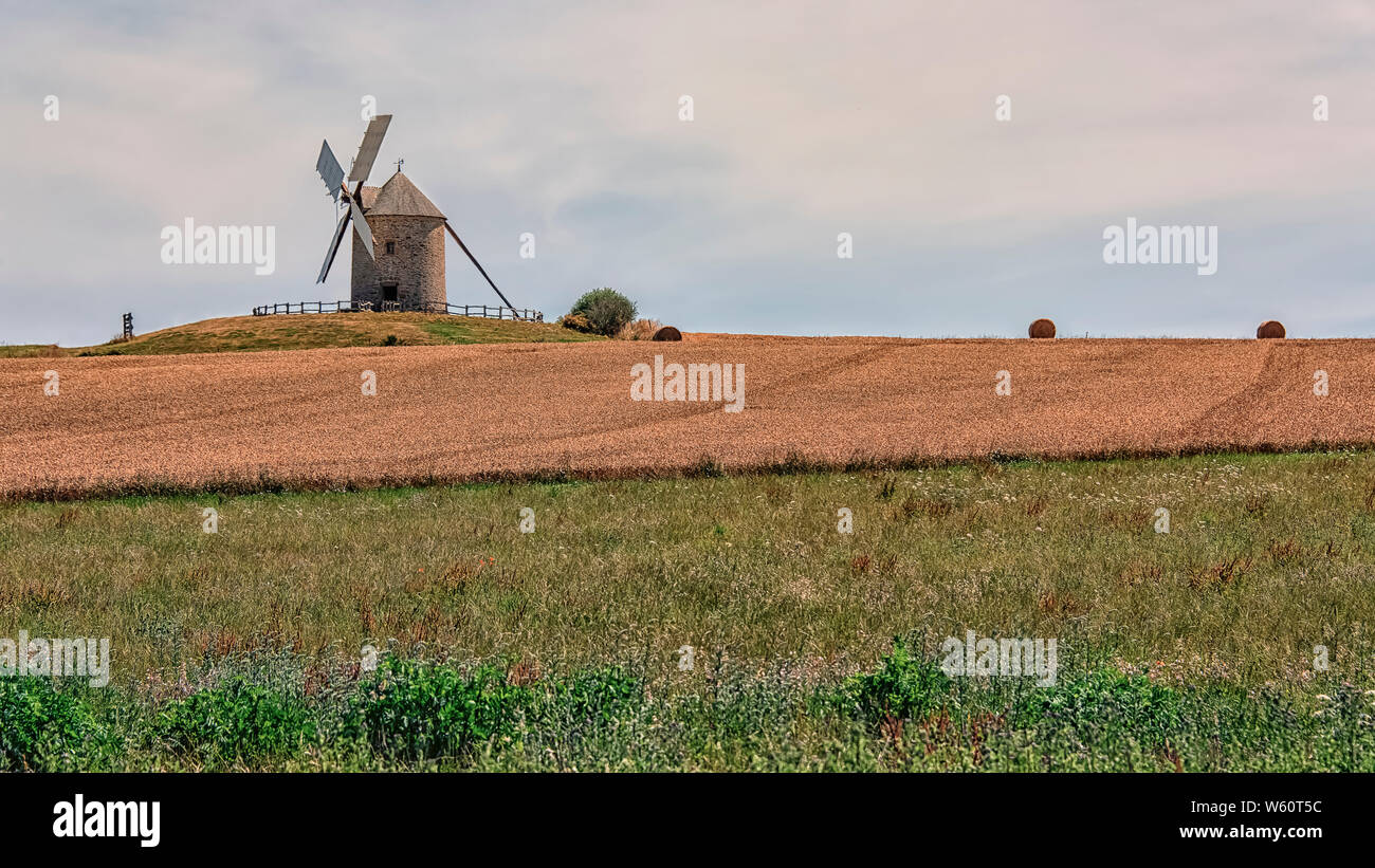 Windmill in Normandy countryside, France Stock Photo